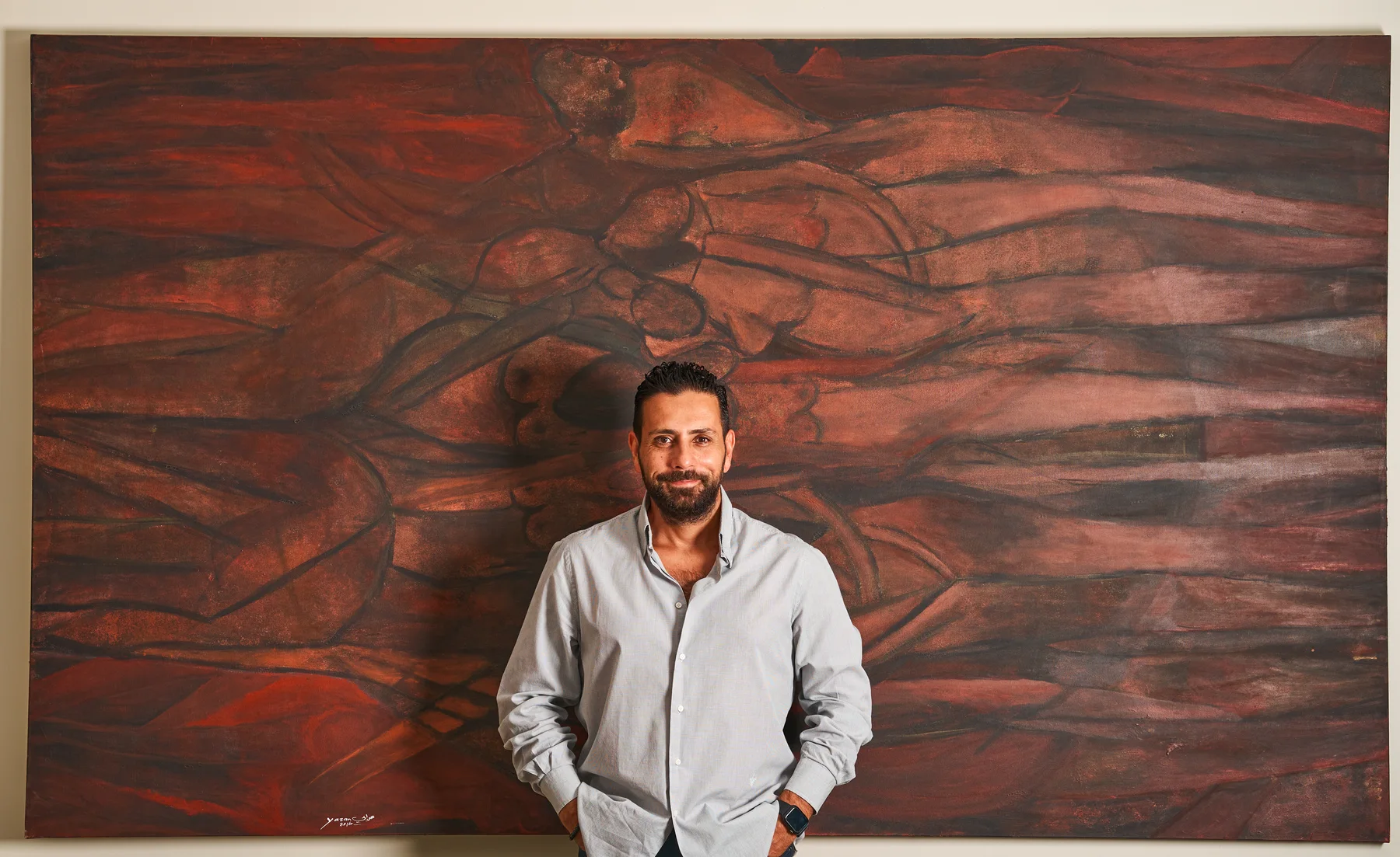 Yazan Orabi with a red canvas