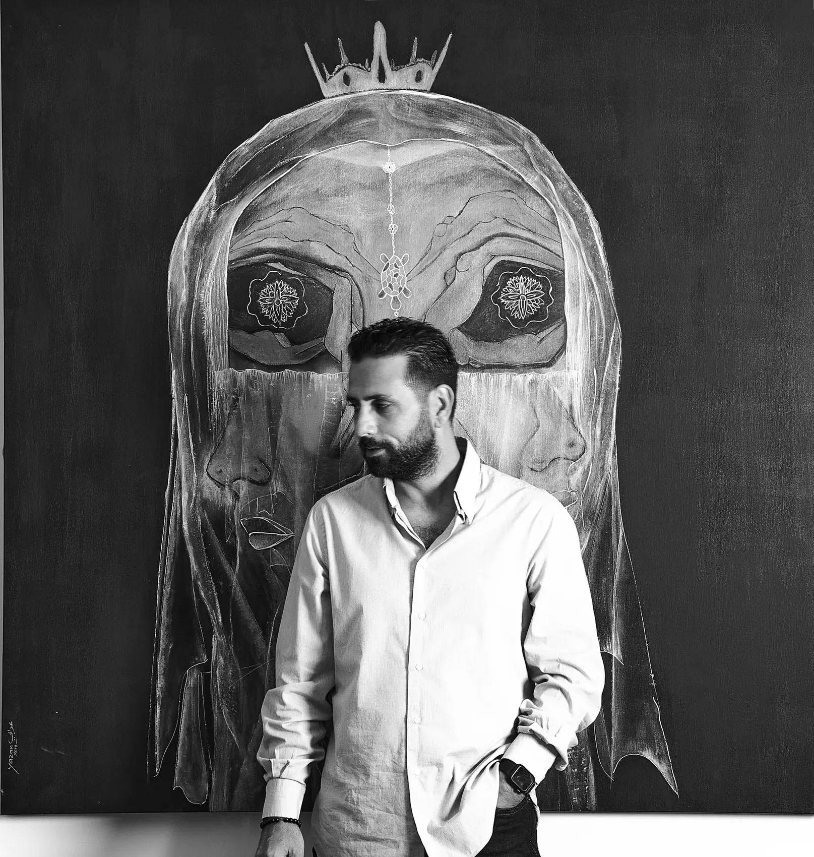 Yazan Orabi in front of his painting